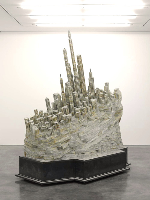 wordsnquotes:  culturenlifestyle:Abandoned Cityscape Book Sculpture by Liu WeiBeijing-based artist Liu Wei carved a stunningly rugged abandoned cityscape from a massive stack of paperback books. He reshaped his materials into one body. New York City-based