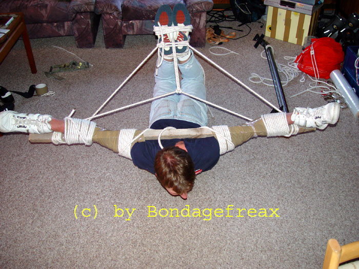 asicswrestoneweb:BONDAGEFREAX IN LOW TOP NIKE SNEAKERS IN ASSORTED BONDAGE POSITIONS:Several