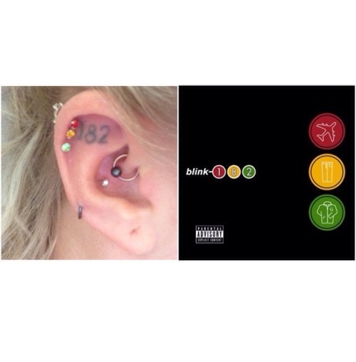my take off your pants and jacket inspired piercings next to my blink tattoo! 