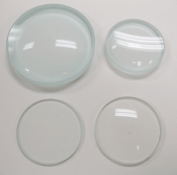 sciencematerial:  Made of polished glass with ground edges. Bi-concave lens: Used for reducing the size or spreading out light, with two inward curving symmetrical faces 