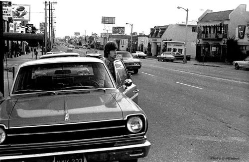 thecatharsis011:  Mick Jagger outside Elektra Studios on La Cienega in 1969 in a “daylight" Rambler.. 