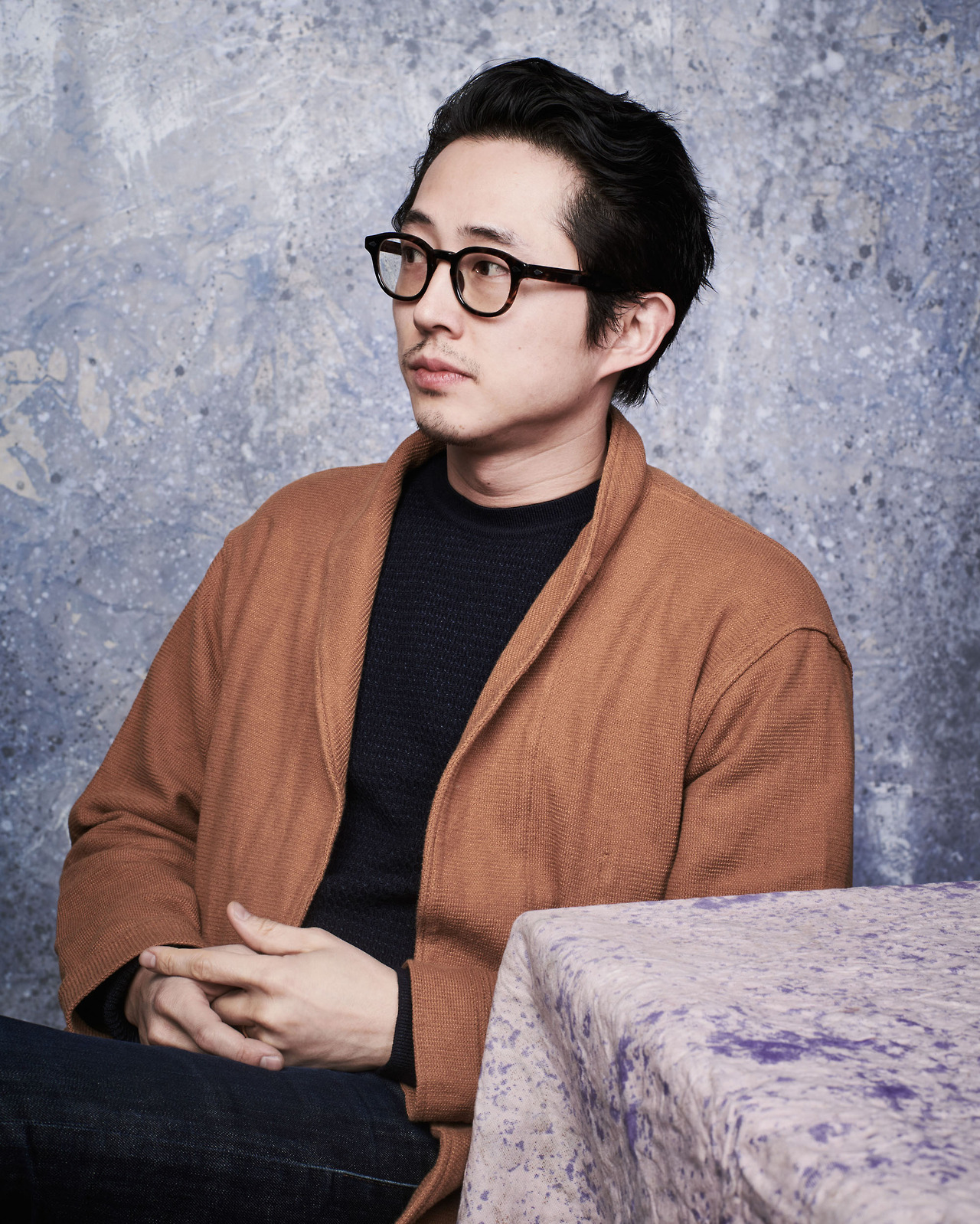 celebsofcolor: Steven Yeun poses for a portrait at Deadline Hollywood Studio during