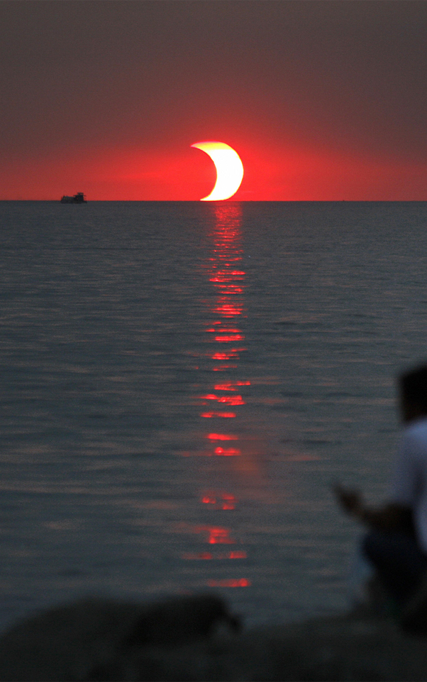 scientistmary:  Partial solar eclipse over Philippines. Captured by Gil Nartea in