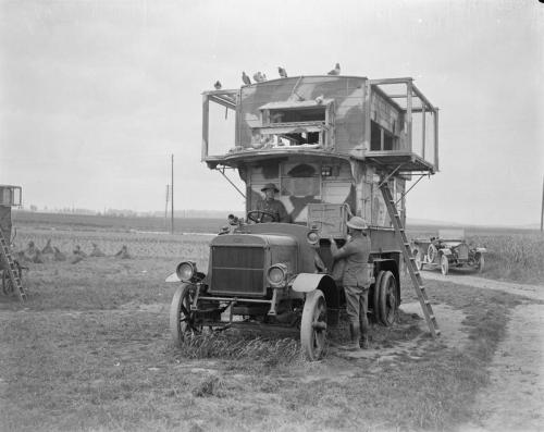 scrapironflotilla:A former London double-decker bus (B.2125), camouflage painted, used as a travelli