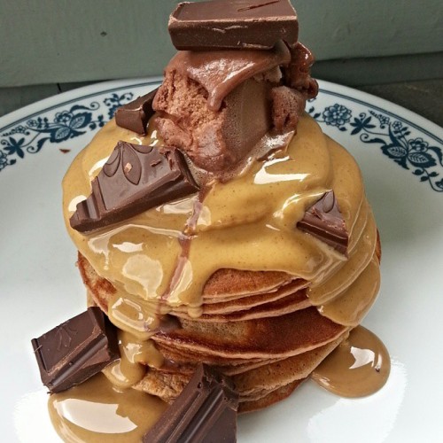 theweaknessleaving:  I needed this badly after an intense chest day and sprints on the track.  Double chocolate protein pancakes topped with melted peanut butter, a scoop of chocolate froyo and dark chocolate chunks.
