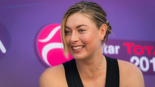 alwayswithsharapova:Maria Sharapova with the kids on meet & greet at Doha, Qatar.