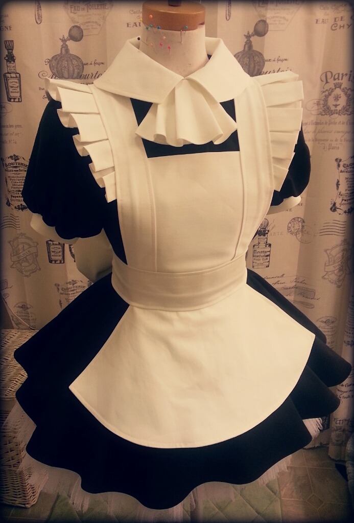 shikarius:  Since the cat’s out of the bag, here’s the detail on the maid uniform