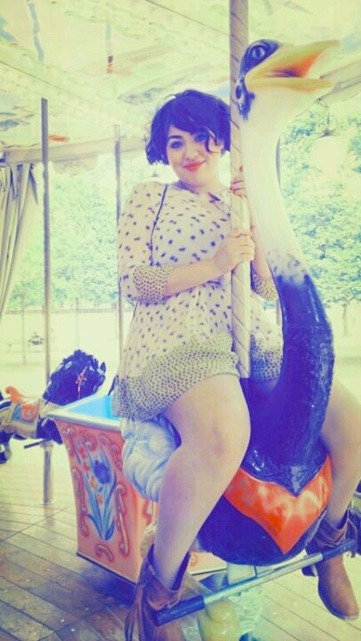 bruja-magic:  We snuck onto the carousel next to the Eiffel tower… an older lady
