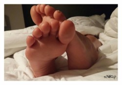 scottnikipowers:  Nikis tiny sexy feet…size 5 ½!!!! She loves me getting on my knees to kiss them and tell her how lucky I am…