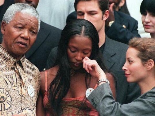 murielheslop:Naomi Campbell having her assistant wipe away her tears, 1998