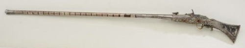 Silver mounted snaphaunce musket with niello decor and “pasted” jewel inlays.  Crafted b