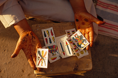 A fortune teller displays her cards in Jemaa el Fna square in Marrakesh, Morocco, June 1971.Photogra