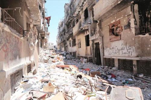 The graffiti reads: &ldquo;Assad or we burn the country&rdquo;; and indeed they did not hesi
