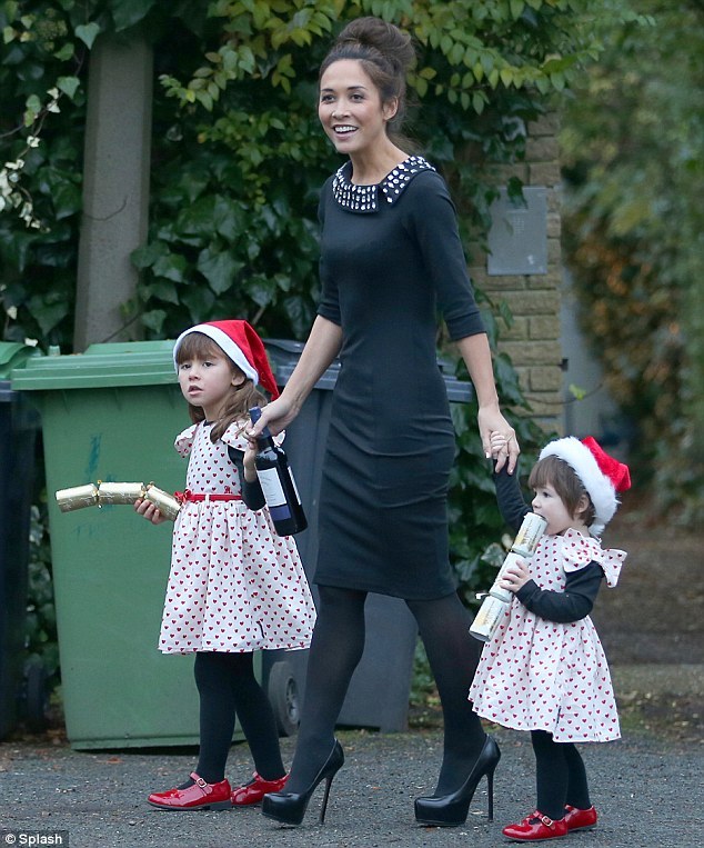 elizabethswardrobe:  Myleene Klass in Yves Saint Laurent heels with her daughters