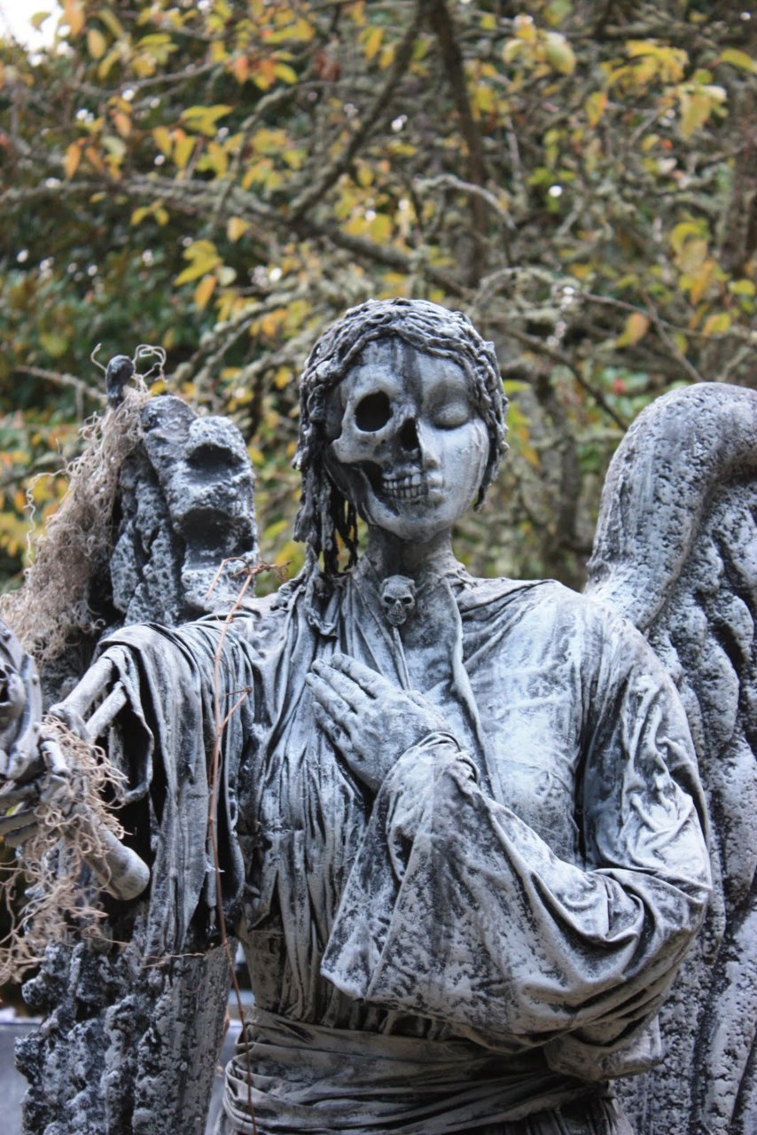 dircat:  sixpenceee: Cemetery statue representing half life and half death. (Source)