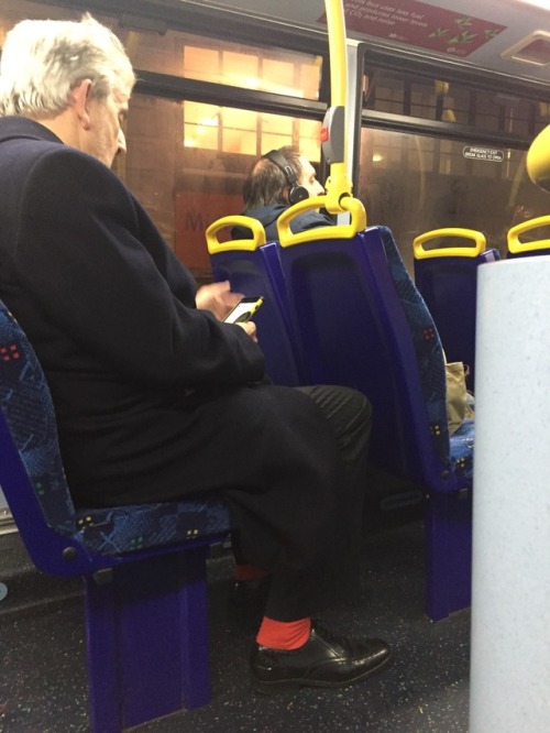 Daddy on the bus at Charring Cross. Love the red socks - very daring!