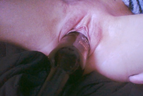 gettingstuffed:  Love it…. She looks stretchable, but once the bottle’s done with her its like she’s transformed per pussy into a perfectly sized socket for it to slide back in to.  fantastic wrecked cunt in the last pic