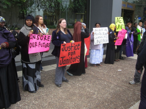 Columbus janitors, security officers and community members rallied on Monday to call on business lea