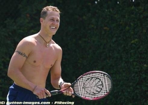 More Schumi tennis action. He had a go at reviving the Topless Tennis craze that was such a hit duri