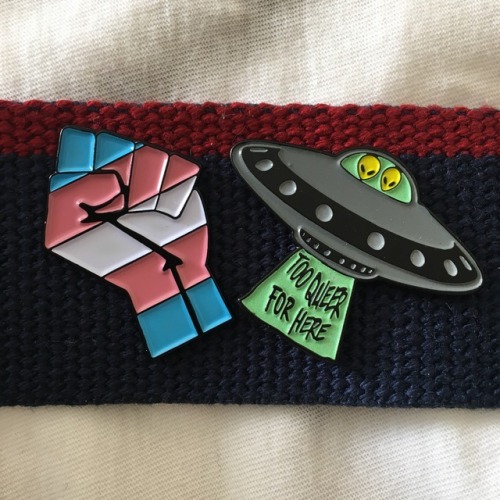 littlealienproducts: Abprallen’s Trans Pride and (glow-in-the-dark) Too Queer For Here pins!! 