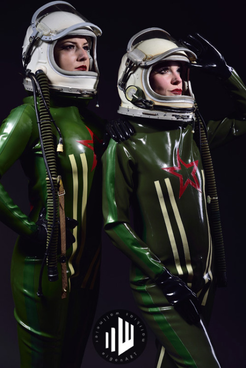 latexcrazy:  La Poupette &amp; Luby Wayne wearing awesome JET FIGHTER heavy rubber catsuits from