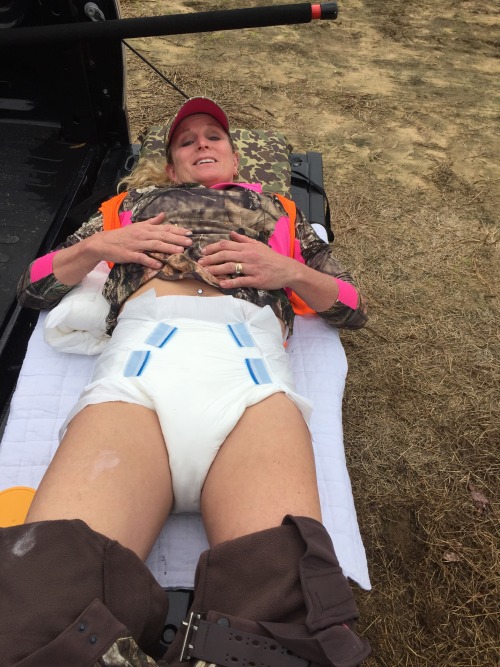 thebambinogirl:  I went hunting again yesterday and seen some nice deer but nothing I want s to shoot. We had to much equipment inside the truck so Daddy used the tailgate of the truck as a diaper changing table. I felt like a real baby having my diaper