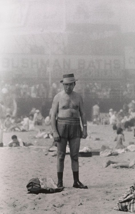 flashofgod: Diane Arbus, Man in hat, trunks, socks and shoes, Coney Island, NY, 1960.