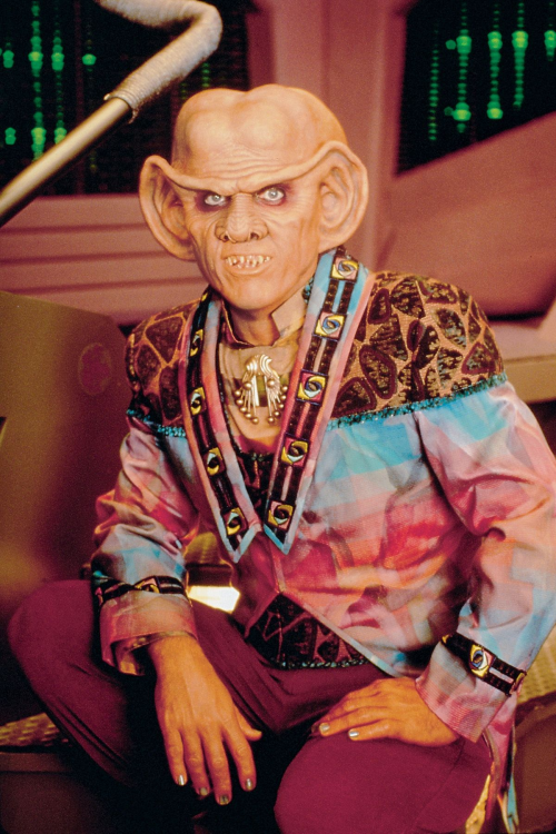 Quark from Star Trek in a questionable outfit