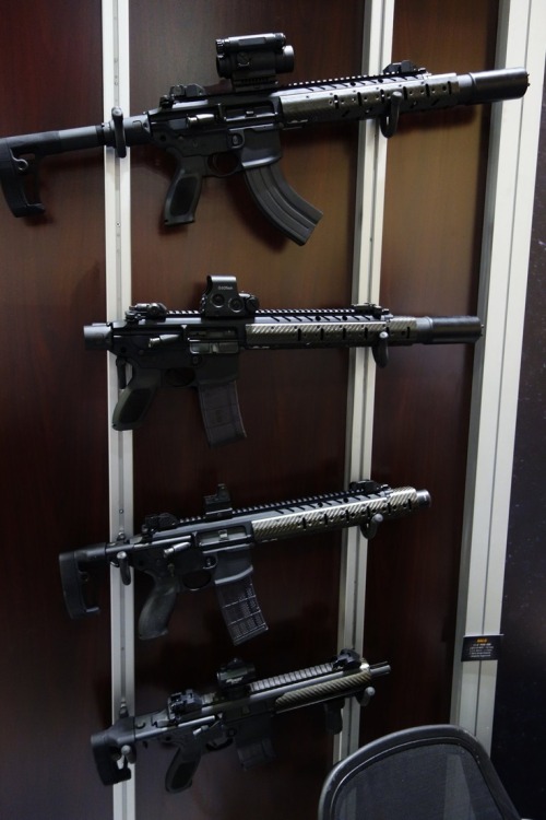 45-9mm-5-56mm:  awesomeness2:  thedepthcharger:  Sig Sauer MCX. It is operated by a dual short stroke piston gas tappet system with the recoil spring assembly in the upper, so no buffer tube is needed. There will be an integral suppressor available,