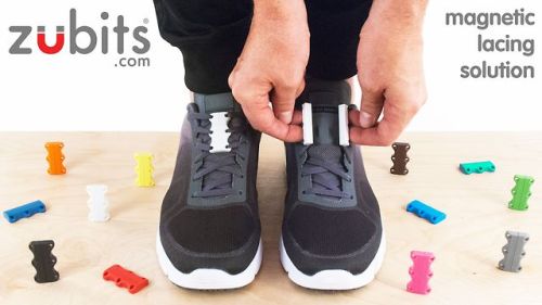 spoonie-living:[Image: Two feet in tennis shoes with Zubits (two rectangular magnets clicked toget