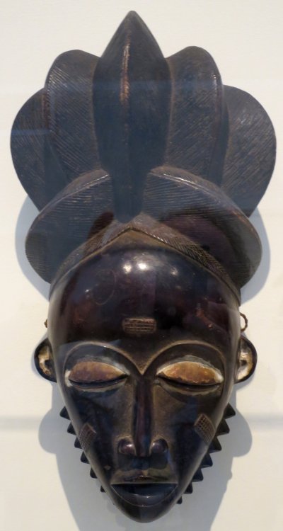 Female portrait mask of the Baule people, Côte d'lvoire.  Artist unknown; 20th century.  Now in the 