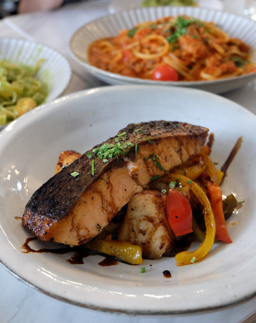 Pan Seared Salmon- Paired with chunky roasted baby potatoes, mixed peppers compote and slashes of ba