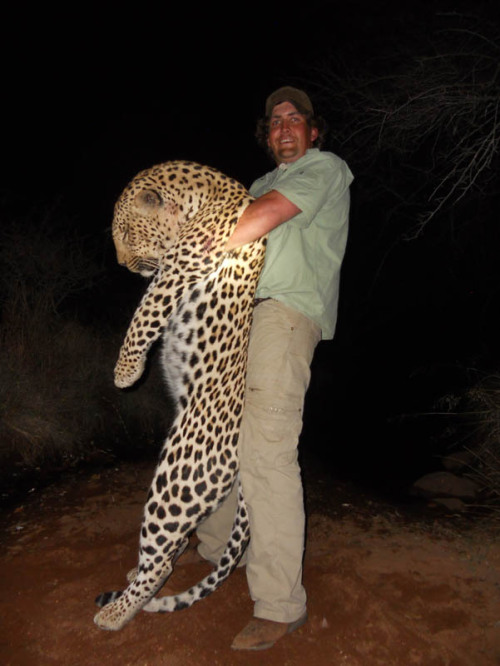 onestonedcrow:  treekisser:  There are some things in life I just simply can’t comprehend. Things like smiling with pride next to a beautiful animal whose life you have just stolen. So-called “trophy pics” from the Dallas Safari Club have my blood