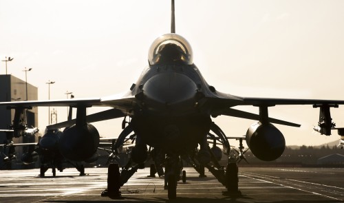 militaryarmament:U.S. Air Force F-16 Fighting Falcon fighter aircraft’s assigned to Spangdahlem Air Base, Germany, sit on the flight line of Ramstein Air Base, Germany, April 1, 2015. 