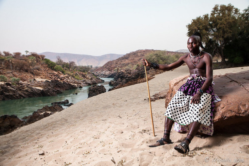 Himba man, by UrsulaOn the banks of the Kunene River in Namibia, two young Himba men were acting as 