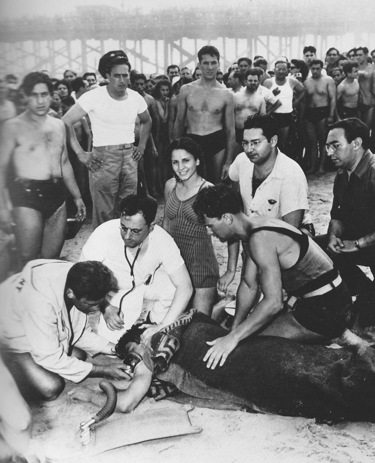 historicaltimes:
“A young woman finds the most inopportune moment to smile at the camera, as medics try to revive a drowned man at Coney Island, New York, 1940 - by Arthur Fellig -
namraka:
“Arthur Fellig better known by his pseudonym Weegee was a...