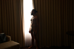 psicoloco:A lonely man in a hotel room. (Sunrise,