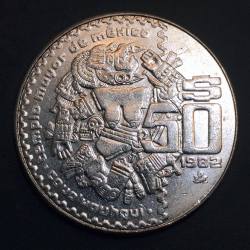 cazadordementes:  Moneda de 50 pesos mexicanos de 1982. En ella aparecía la diosa lunar y hermana de Huitzilopochtli, coyolxauhqui. 