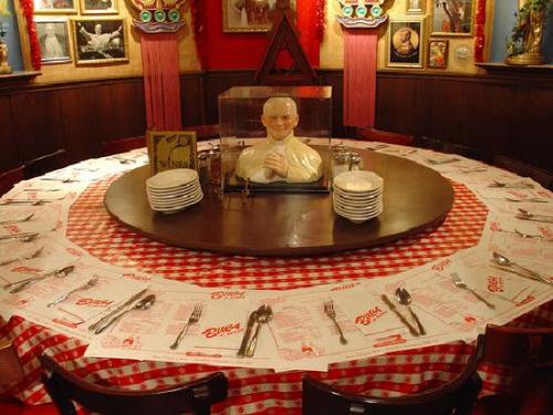 all the pictures online of the pope table have benedict encased in glass but the one i went to his b