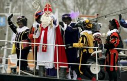 language2go:  takingbackourculture:  racistmomentoftheday:  November 16, 2014 Better Not Pout: Sinterklaas and the ‘Zwarte Pieten Are Coming to Town  Dutch police just arrested 90 people protesting against this ridiculousness. Learn about the history