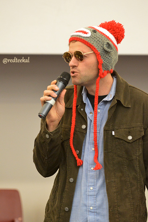 redteekal:  Misha gets welcomed on stage and out he comes in a monkey hat and sunnies.