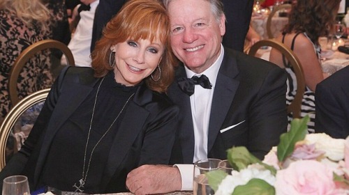 More photos of the happy couple at Celebrity Fight Night.