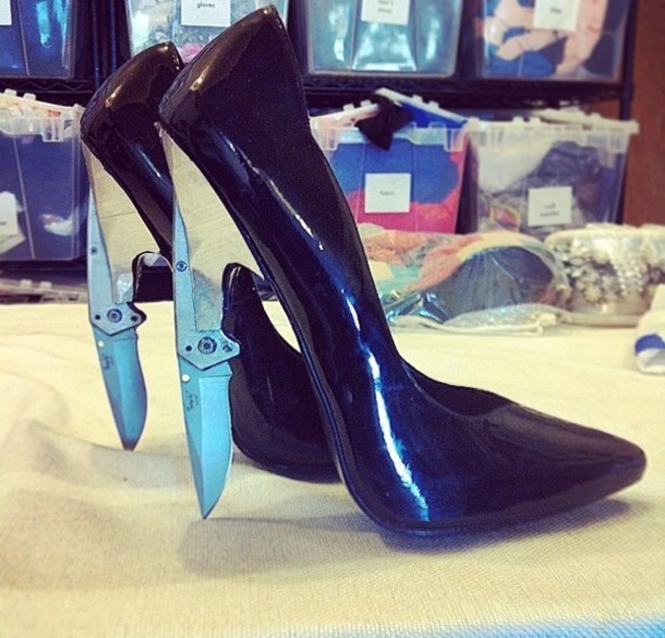 otherwindow:    Mortal Kombat fighter weapons: Bladed fans. Nun chucks. Guns. Deadly