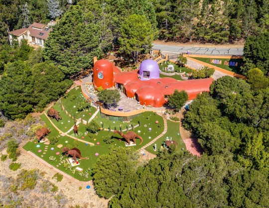 New owner of California's "Flintstones" house sued by city after adding dinosaurs