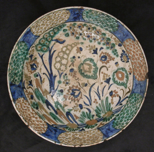 Dish, Islamic ArtMedium: Stonepaste; underglaze painted in black, blue, and green with red and yello