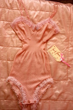 fearofflowers:  Vintage pastel pink knitted lace bodysuit 