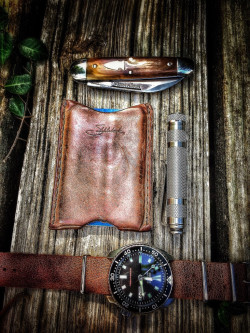 notaknife:  Nice HDR photo of a super simple EDC.  Leather. Wood. Worn. Automatic.  Nicely done.