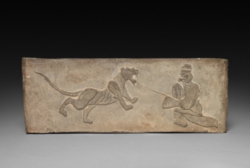 Panel from Model Cooking Stove: Lancer Jousting with a Tiger, 1st Century BC, Cleveland Museum of Ar