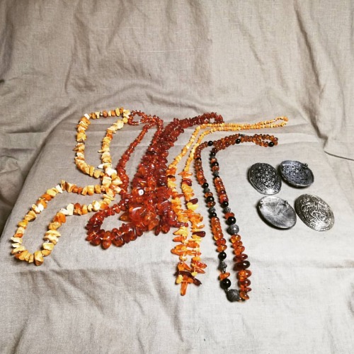 Viking bling!   Lots of amber necklaces and some brooches. I just hang the amber between my brooches