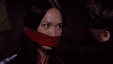 gaggedactresses:  The delicious Fann Wong OTM’d in Shanghai Knights. Side note: never watch Shanghai Knights. 